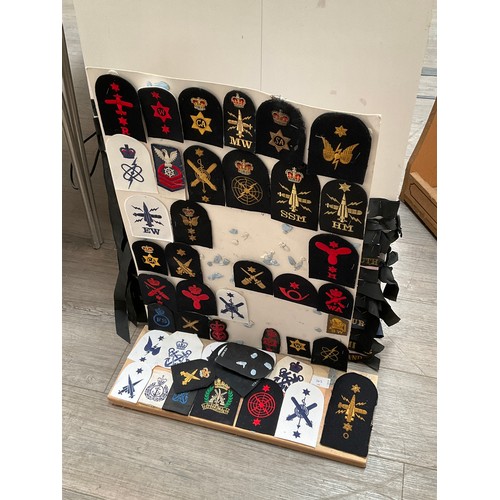 5475 - A display of Royal Naval badges