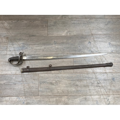 5487 - A Victorian 1827 Pattern Rifle Officer's Sword, the Gothic style steel hilt with hung bugle and crow... 