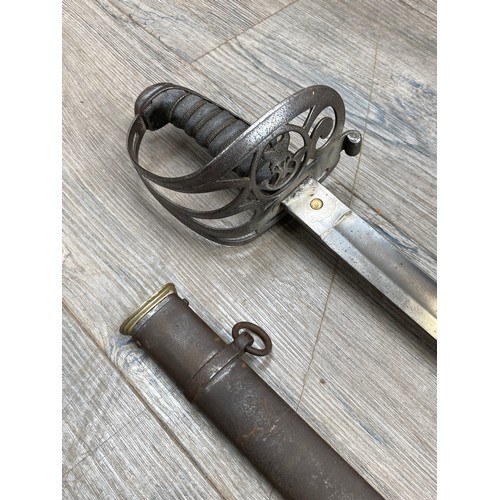 5487 - A Victorian 1827 Pattern Rifle Officer's Sword, the Gothic style steel hilt with hung bugle and crow... 