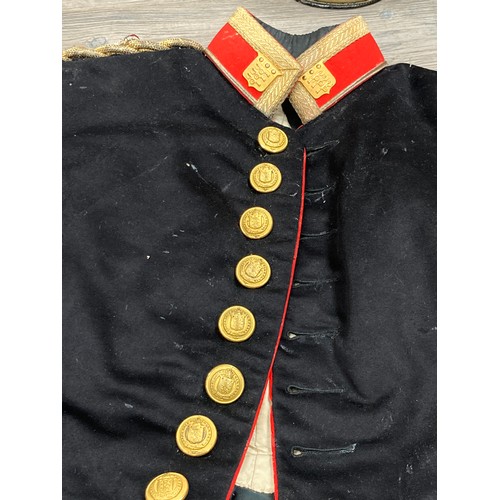 5490 - An Edward VII era Army Ordnance mess dress jacket with trousers, insignia and webbing etc, moth dama... 