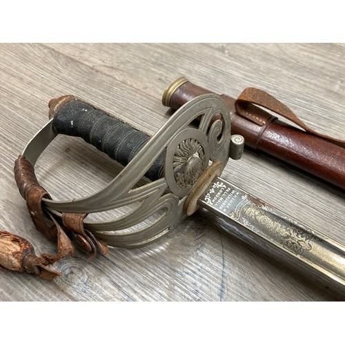 5498 - A WWI era 1854 pattern officer’s sword  with HAC emblem to guard and engraved blade by Henry Wilkins... 