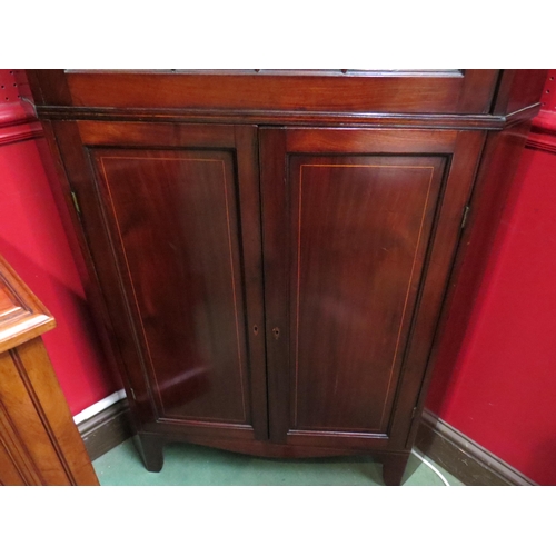 4043 - A George III line inlaid mahogany corner cabinet in the manner of 