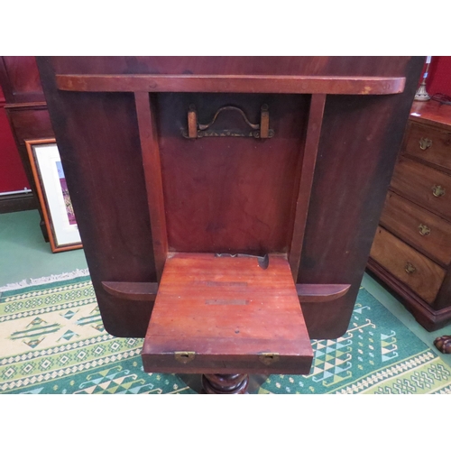 4061 - Circa 1800 a mahogany tilt top table, the reeded edge top over a turned column and outswept legs on ... 