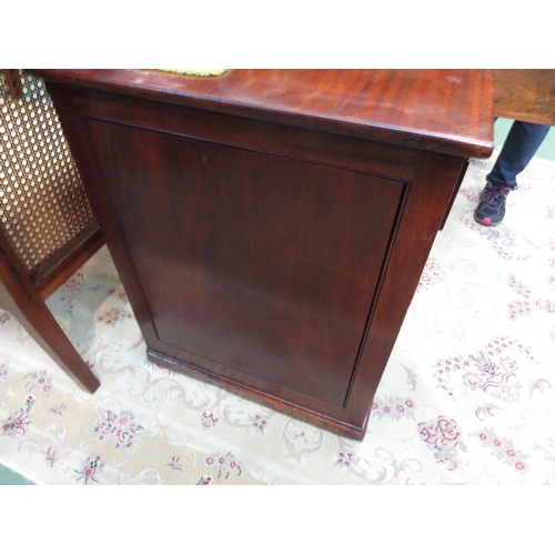 4095 - A 19th Century mahogany twin pedestal desk, the three frieze drawers over two single door cupboards ... 