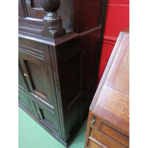 4117 - A Circa 1700 English pegged oak court cupboard with unusual bank of nine cupboard panelled doors hav... 