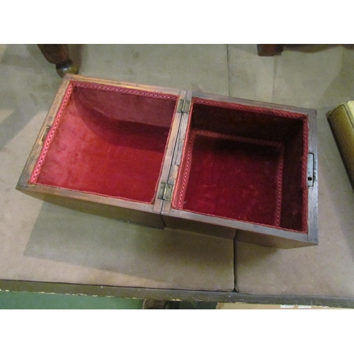 4205 - A 19th Century flame mahogany dome top box the hinged lid opening to reveal a velvet lined interior,... 