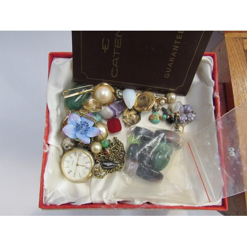 4303 - A box of bijouterie including watches, loose stone, brooches, necklaces, etc