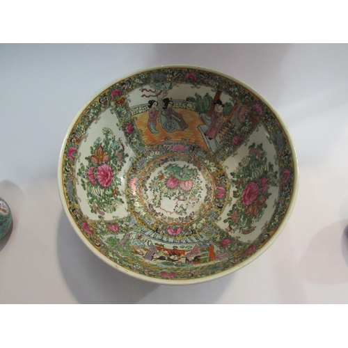 4342 - A Cantonese famille rose bowl, foliate and garden scenes with figures, character marks to base, 30cm... 