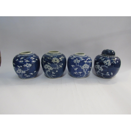 4359 - Four Chinese blue and white ginger jars, one with lid, 13cm tall, decorated with Cherry Blossom and ... 