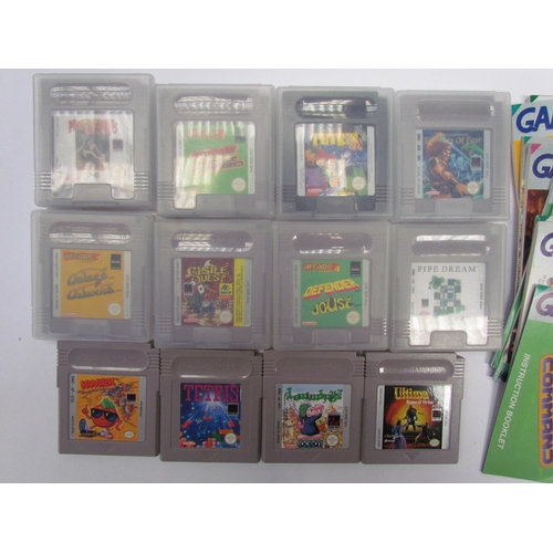 7024 - Twelve Nintendo Game Boy games and manuals to include Ultima Runes of Virtue, Lemmings, Arcade Class... 