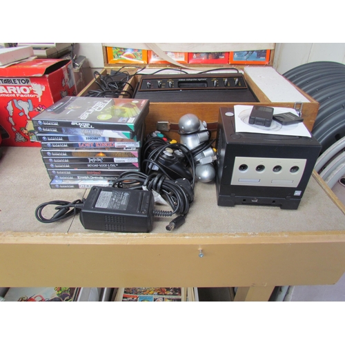 7032 - A Nintendo GameCube computer games console with Game Boy Player, Startup disc, two controllers, 8MB ... 