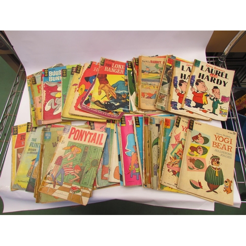 7047 - A collection of Gold Key and Dell comics including Tom and Jerry, Huckleberry Hound, Frosty The Snow... 