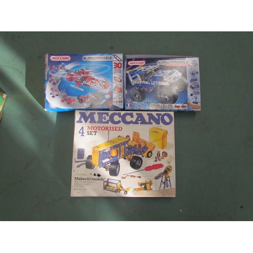 7077 - A Meccano Motorized Set 4 together with two Meccano Multimodel sets (3)