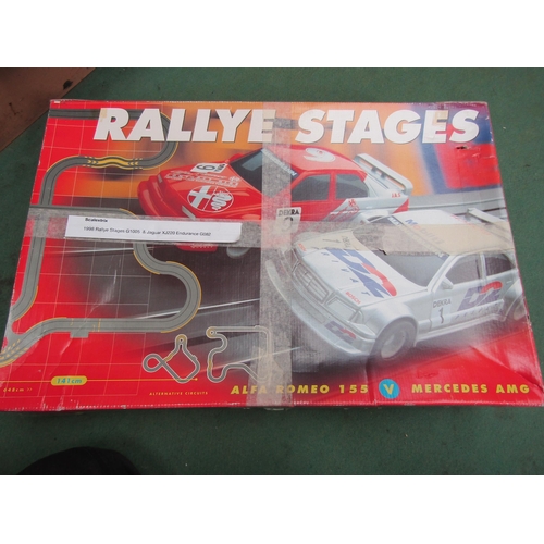 7086 - A box of loose Micro Scalextric to include set G1005 Rallye Stages cars and G082 Jaguar XJ220 car, c... 