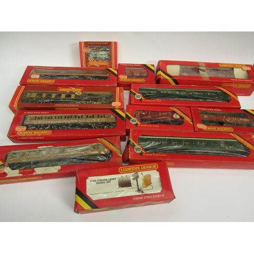 7424 - A collection of boxed Hornby model railway 00 gauge rolling stock coaches and wagons and a Colour Li... 