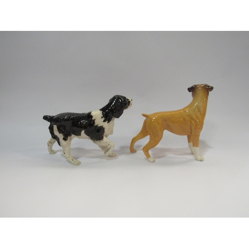 4227 - Two Royal Doulton dog figures, Boxer and Springer Spaniel     (R) £30