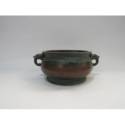 4266 - A bronze two handled censor with elephant handles and character marks