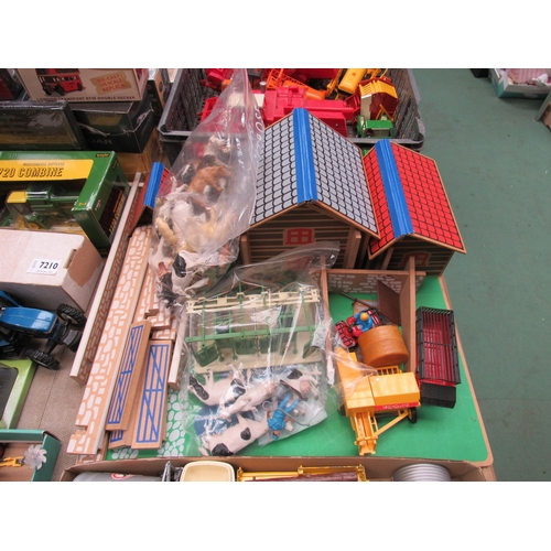 7209 - A collection of diecast and plastic agricultural vehicles, implements including Britains cow milking... 