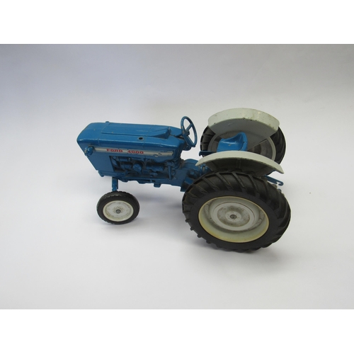 7213 - A playworn diecast Ford 4000 tractor