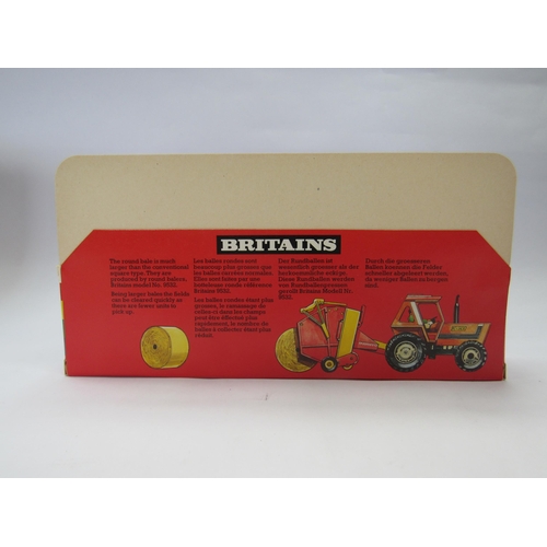 7223 - A Britains farm issue trade box 1743 Round Hay Bales, containing six boxed units