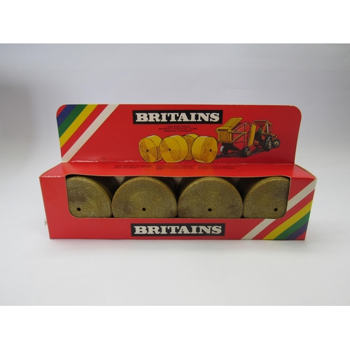 7223 - A Britains farm issue trade box 1743 Round Hay Bales, containing six boxed units