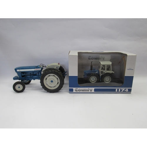 7249 - A boxed Universal Hobbies 1:32 scale diecast Ford County 1174 Tractor and an unboxed 1:16 scale Ford... 