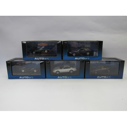 7250 - Five Perspex cased Autoart 1:43 scale diecast Jaguar cars to include E-Type, XJ13, D-Type, XK8 and X... 