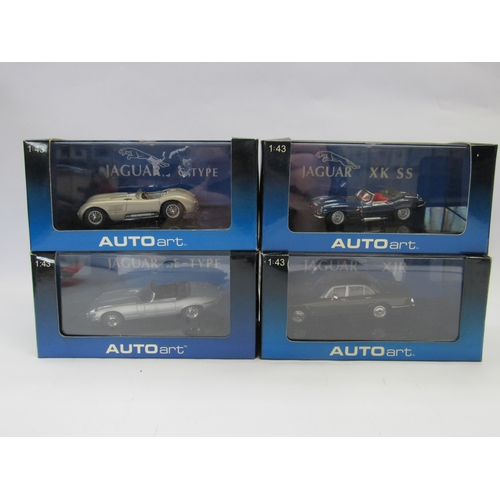 7251 - Four Perspex cased Autoart 1:43 scale diecast Jaguar cars to include XJR, E-Type, XKSS and C Type