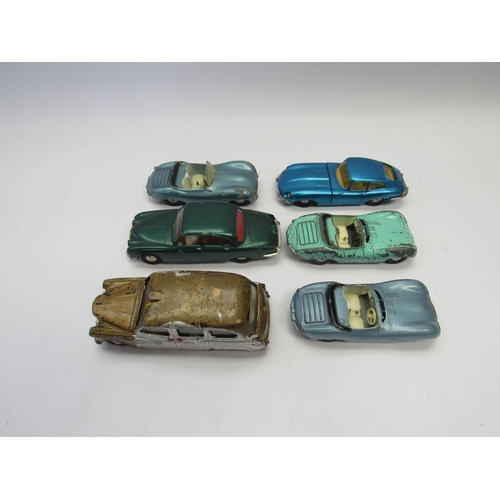 7276 - Six unboxed and playworn Tri-ang Spot-On diecast cars to include Austin Taxi F.X.4 (repainted), Jagu... 