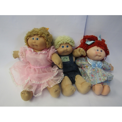 7100 - Three Cabbage Patch Kids dolls