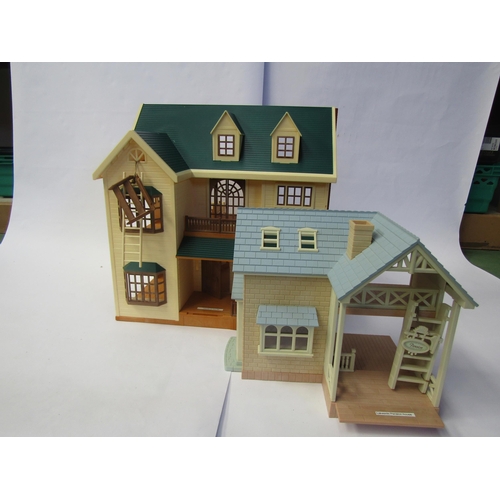 7109 - Two unboxed Sylvanian Families playsets to include House On The Hill and Lakeside Pension House