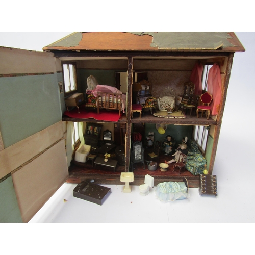 7126 - A small wooden two storey dolls house 'Dingle Bank', with assorted furniture and accessories 36cm ta... 