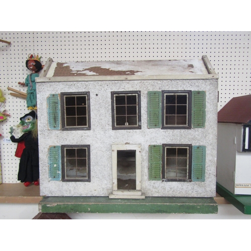 7132 - A Lines Bros two storey dolls house for restoration, circa 1928, 56.5cm tall x x63cm wide x 28cm dee... 