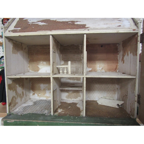 7132 - A Lines Bros two storey dolls house for restoration, circa 1928, 56.5cm tall x x63cm wide x 28cm dee... 