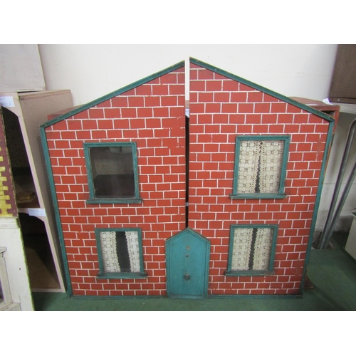 7133 - A two storey dolls house with faux red brick frontage, with assorted furniture and accessories, 77cm... 