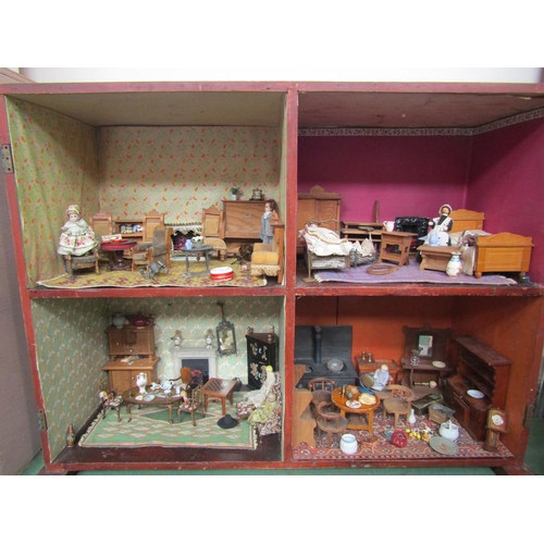 7133 - A two storey dolls house with faux red brick frontage, with assorted furniture and accessories, 77cm... 