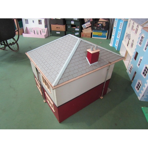 7136 - A painted wooden two storey dolls house as a 1930's detached house with assorted furniture and acces... 