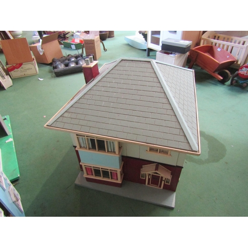 7136 - A painted wooden two storey dolls house as a 1930's detached house with assorted furniture and acces... 