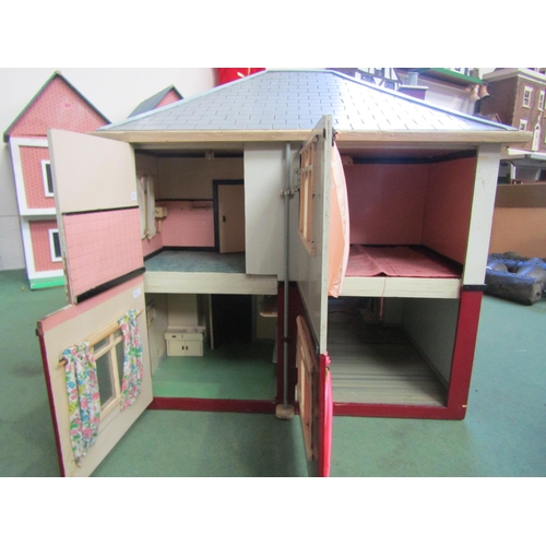 7136 - A painted wooden two storey dolls house as a 1930's detached house with assorted furniture and acces... 