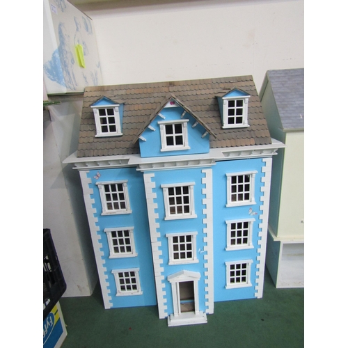 7139 - A three storey dolls house with attic above, together with a small collection of dolls house furnitu... 