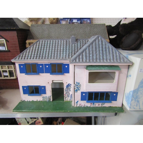 7140 - A Mid Century Tri-ang Avon dolls house and another two storey dolls house (2)      (E) £15-20