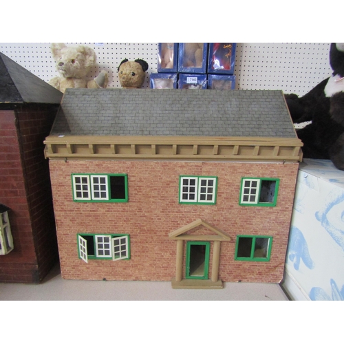 7140 - A Mid Century Tri-ang Avon dolls house and another two storey dolls house (2)      (E) £15-20