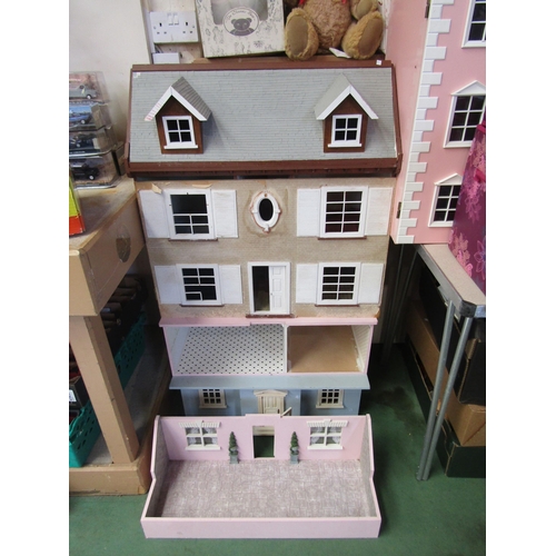 7143 - A two storey dolls house with basement below, 91cm tall (including basement) x 69cm wide x 34.5cm de... 