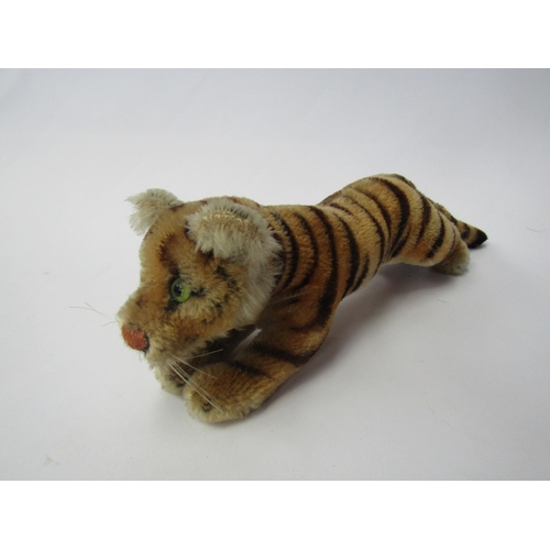 7161 - A vintage Steiff mohair tiger, approx. 30cm long, no button