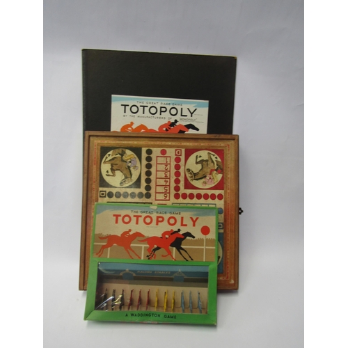 7166 - A Totopoly board with painted lead pieces and a later compedium of games