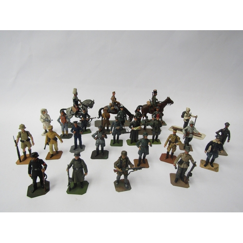 7180 - A collection of lead figures of German soldiers from various regiments including Luftwaffe, Army, Kr... 