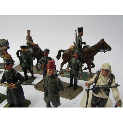 7180 - A collection of lead figures of German soldiers from various regiments including Luftwaffe, Army, Kr... 