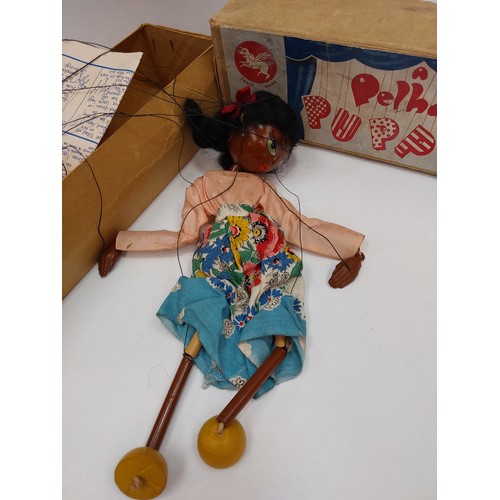 1217 - A Pelham puppet of a black girl in original box with instructions