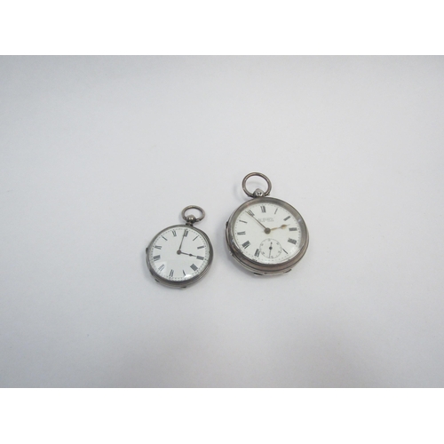 1343 - Two pocket watches; one silver example by W.C. Spikins, Upton Park, the other marked 'fine silver' (... 