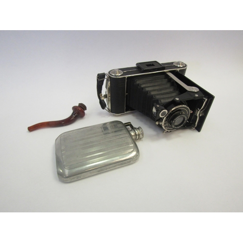 1347 - A cased Kodak Junior 620 camera, a 4oz hip flask and a cased pipe, possibly for opium